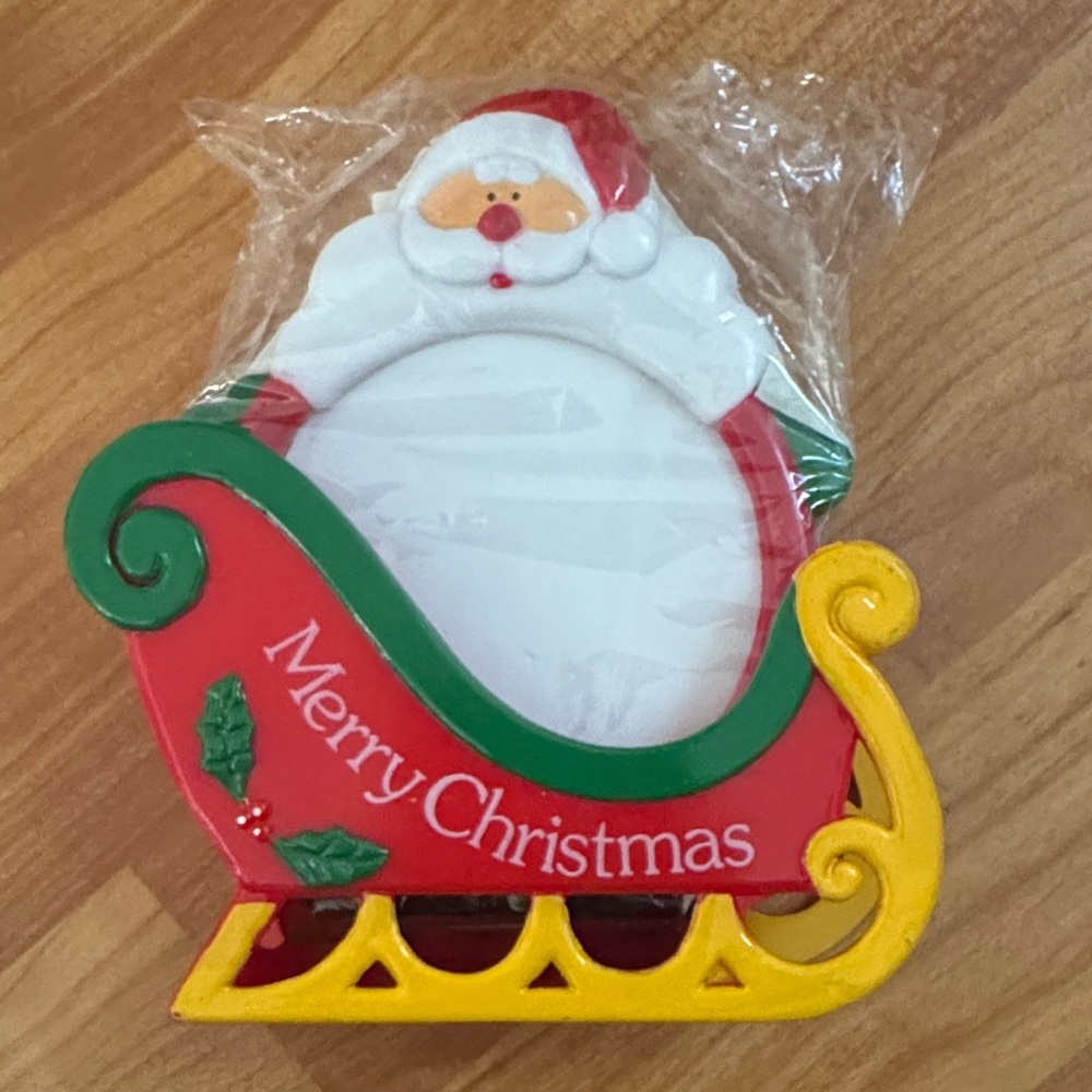 Santa sleigh 4 pc drink coaster set, plastic New w/out box